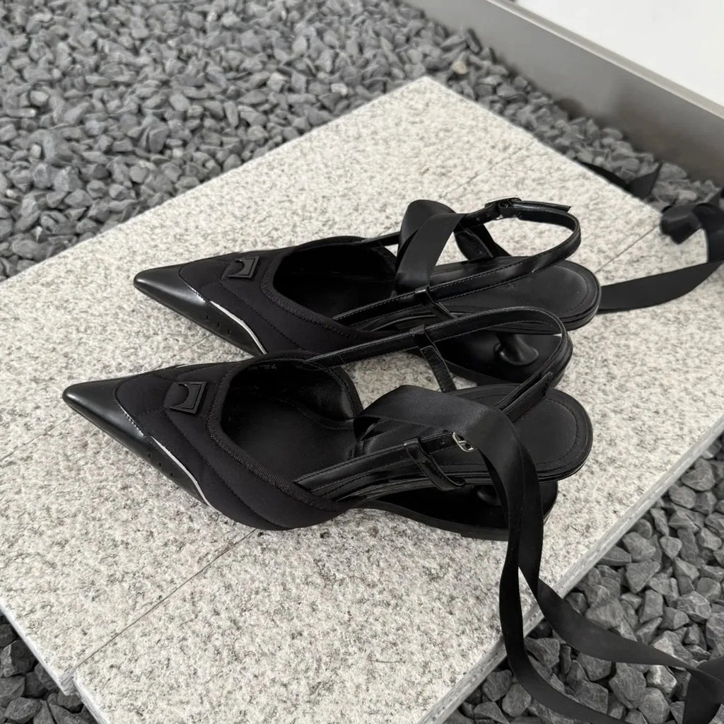 Women's black lace-up high heels with special-shaped root design showing cowhide upper and adjustable ankle fastening