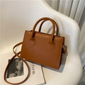 PU synthetic leather small horizontal square shoulder bag in five colour options showing document pocket and single strap