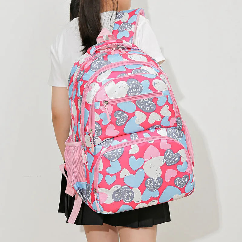 Blue children's school backpack with air pillow belt system for burden alleviation
