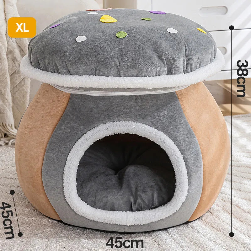 Grey mushroom-shaped plush cat bed on a wooden floor