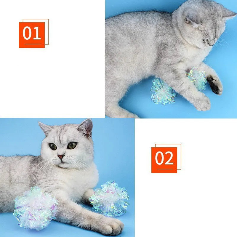 White noise-making paper ball cat toy on floor for indoor cat play