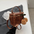 Box bucket bag in PU material with sewing line detail, available in Black, Brown, and Coffee, includes a free pendant