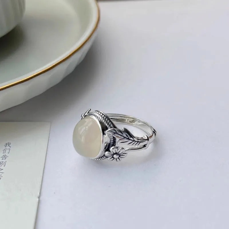 Adjustable vintage copper ring with antique finish and imitation white chalcedony colour