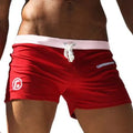 Men's nylon swim shorts with drawstring waist in black, blue, lake blue, orange, red, and A colour options.