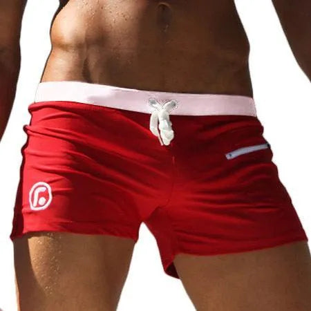 Men's nylon swim shorts with drawstring waist in black, blue, lake blue, orange, red, and A colour options.