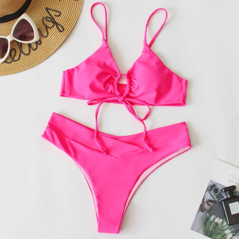 Women's orange tied bow split bikini swimsuit for swimming and wading activities