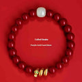 Handmade cinnabar Snake Year bracelet with Chinese zodiac design and roll snake beads.