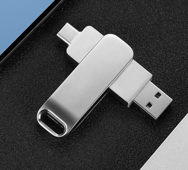 Silver rotating metal USB flash drive showing both USB and Type-C connectors
