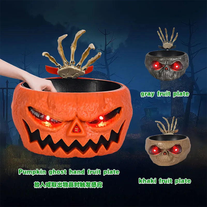 Plastic Halloween candy bowl with motion-activated skeleton hand and lighted red eyes, grey khaki or pumpkin colour