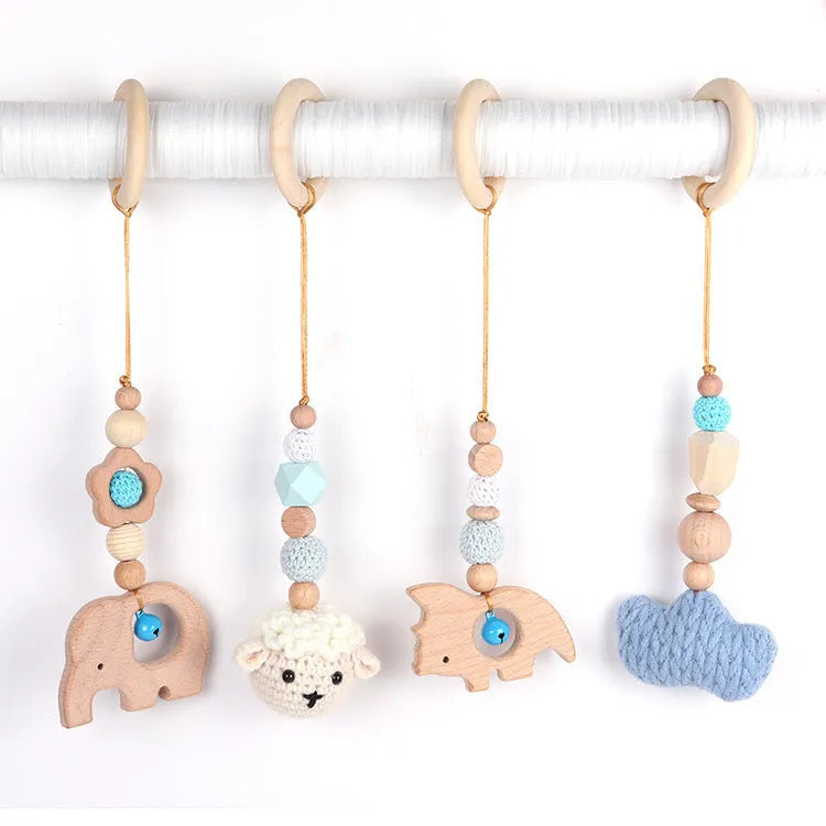 Beech wood baby rattle toy with animal decoration, 28cm long, available in six colours