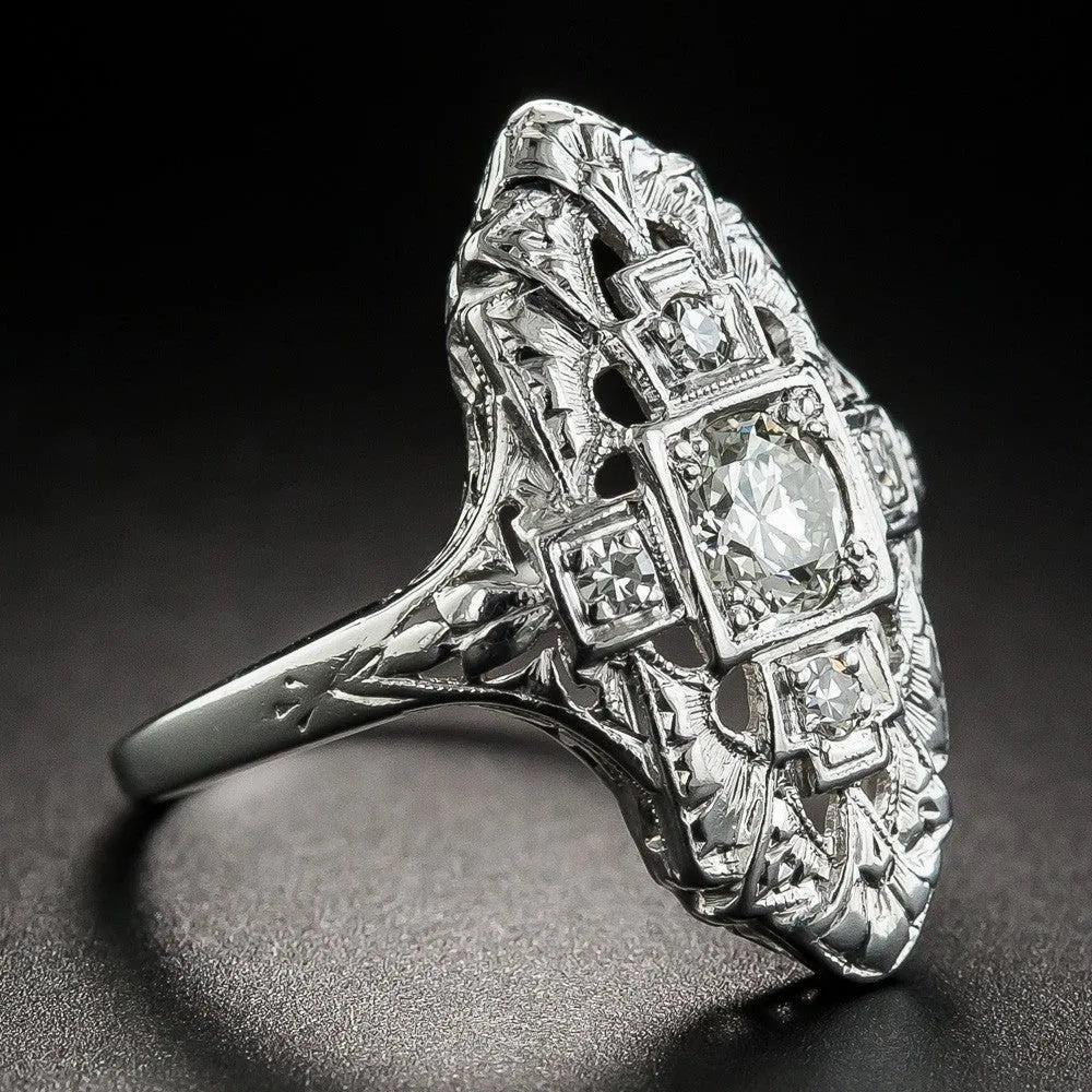 Geometric hollow out silver ring with diamond-studded details on copper construction
