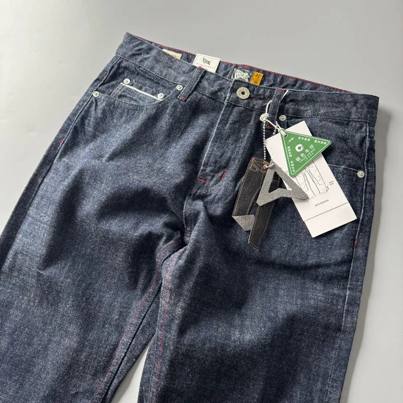 Men's primary colour straight-leg denim jeans with a mid-waist retro style on a white background.