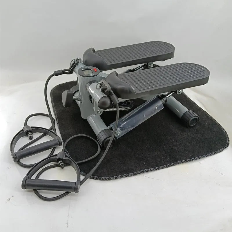 Silver grey hydraulic pedal exercise machine for waist slimming and home fitness
