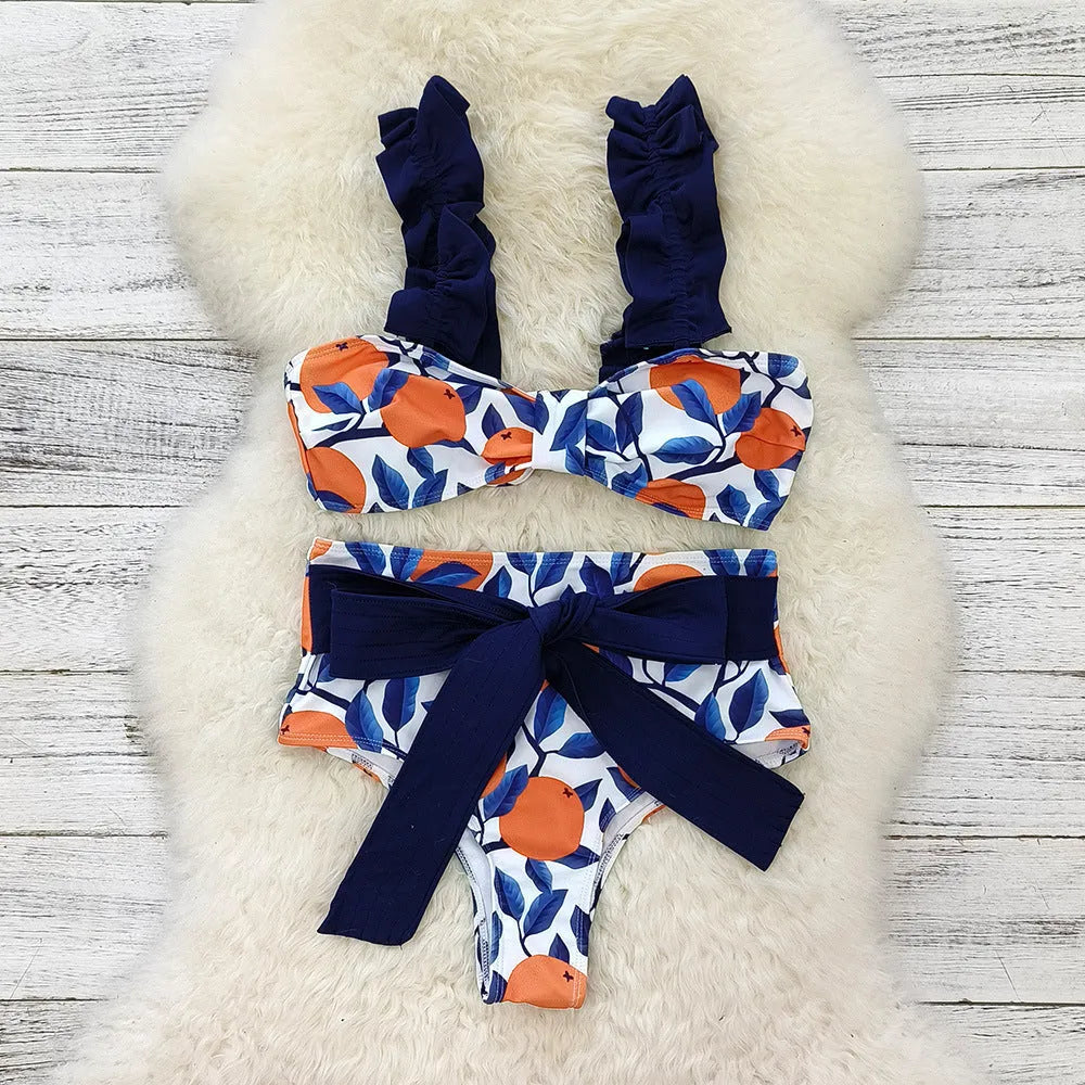 Women's blue leaf orange printed high waist bikini swimsuit on hanger