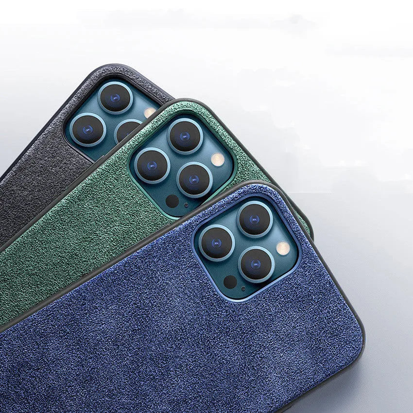 Suede luxury back case for iPhone on a dark background, shown in elegant black, dark night green, and dark blue colours.