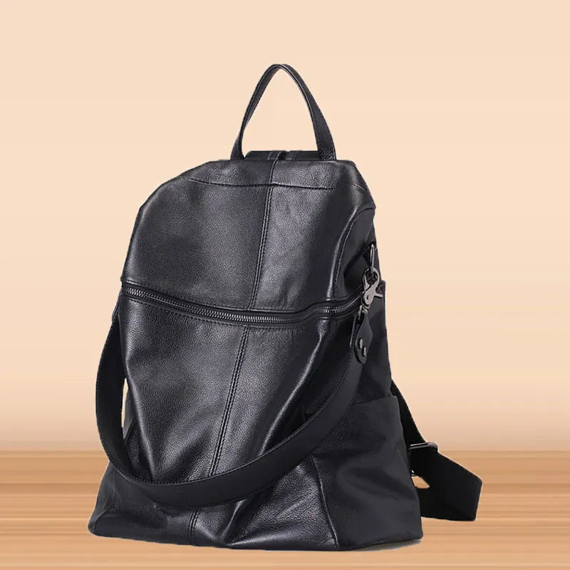 Genuine leather women's retro backpack showing multiple compartments and European-American styling