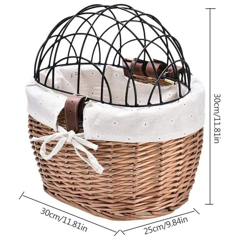 Medium honey-coloured wicker bicycle front basket for small cats and dogs on a road bike handlebar