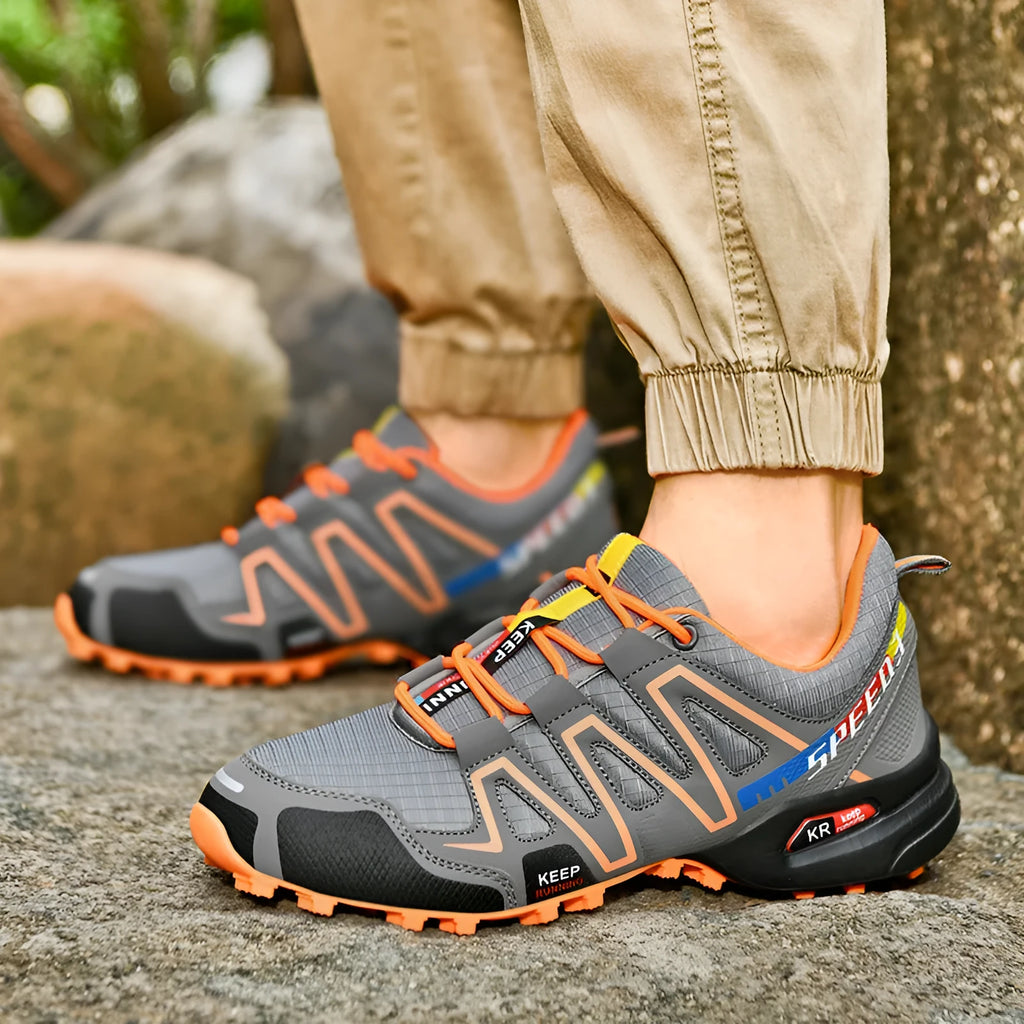 Men's grey orange synthetic leather low-top casual shoes with non-slip rubber sole.