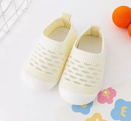 Baby soft sole non-slip walking shoes in fly woven cotton and natural rubber, available in multiple colours and sizes 11.5-15.5cm