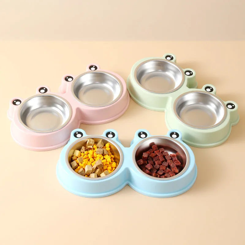 Blue stainless steel double pet bowl with frog design for cat and dog food and water.
