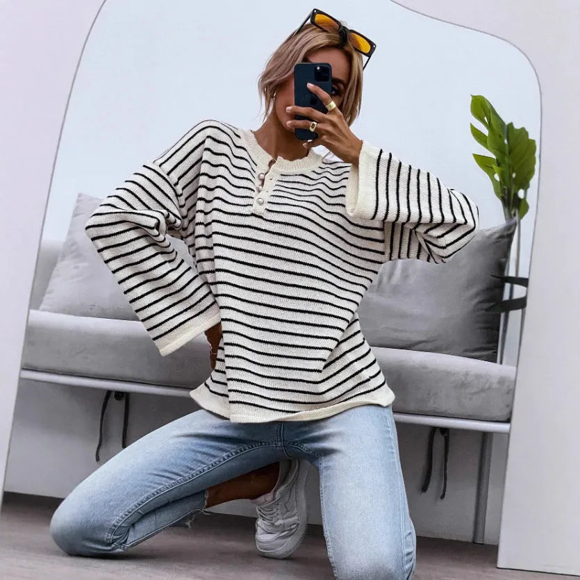Black striped women's drop-shoulder long sleeve top with button detail