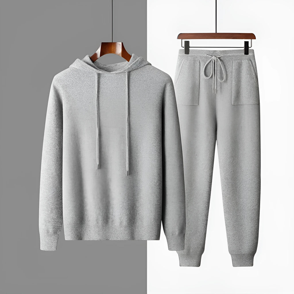 Men's light grey cashmere hooded sweatshirt and trousers set for winter leisure wear.