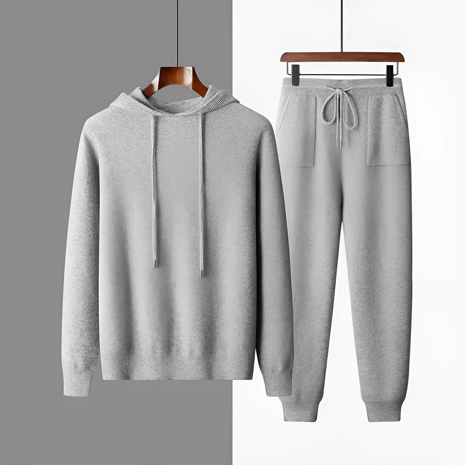 Men's light grey cashmere hooded sweatshirt and trousers set for winter leisure wear.