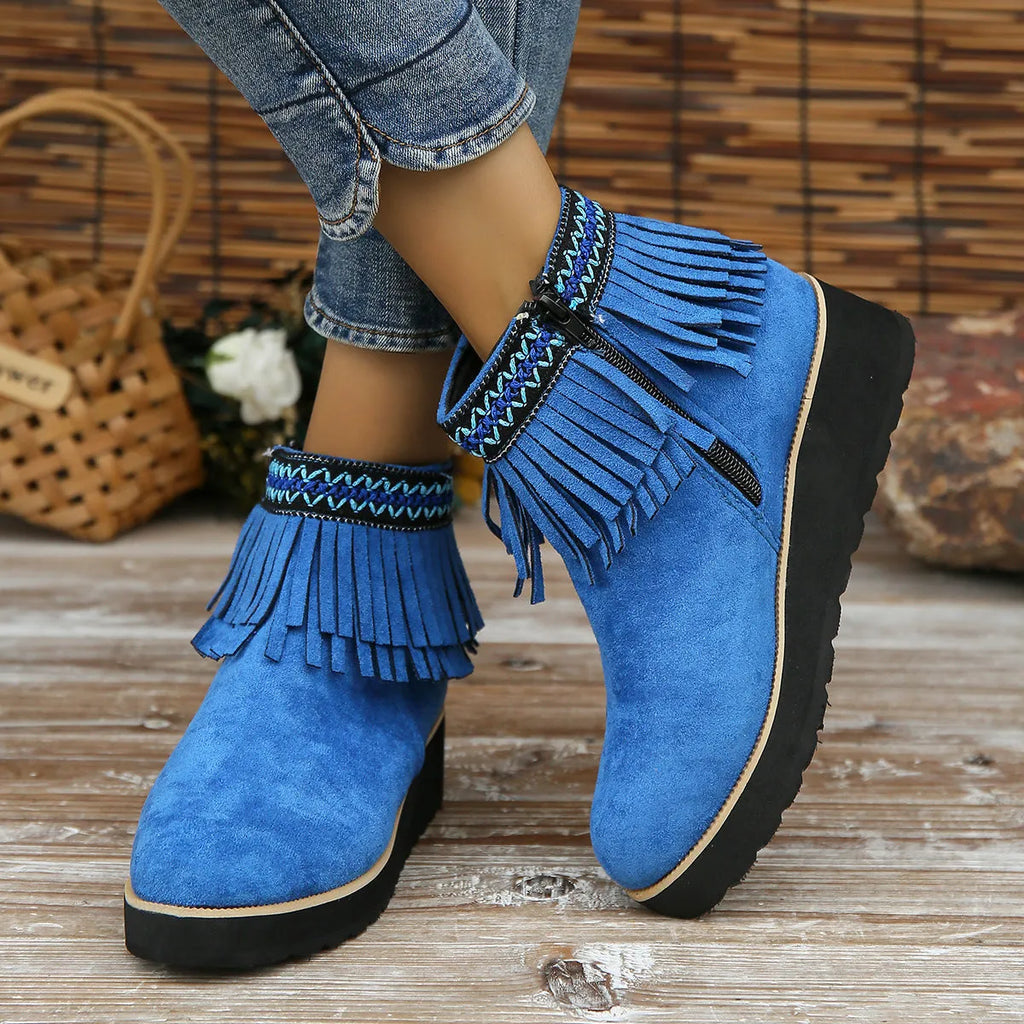 Women's suede wedge ankle boot with side zipper and tassel detail in black