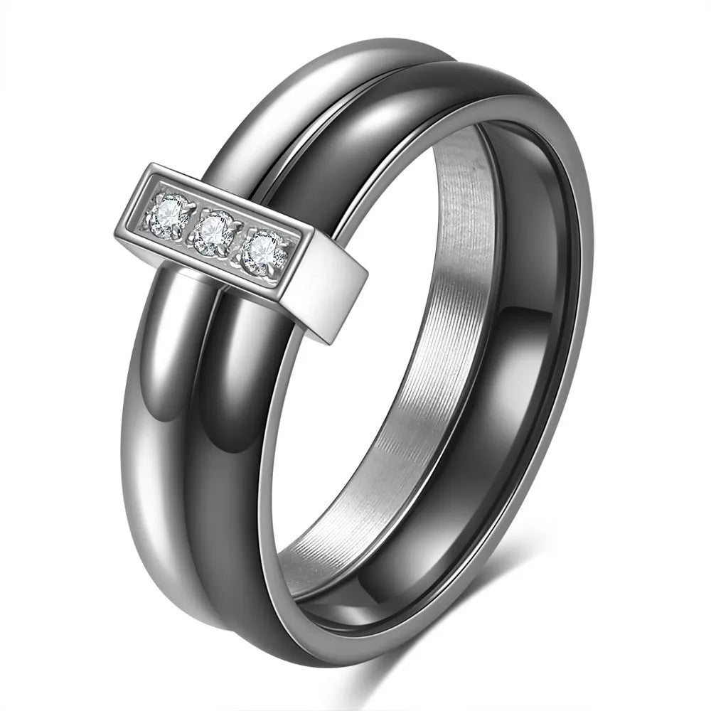 Ceramic geometric ring with glossy stitching and inlaid zirconium on 6MM band, shown in steel black and gold white finishes
