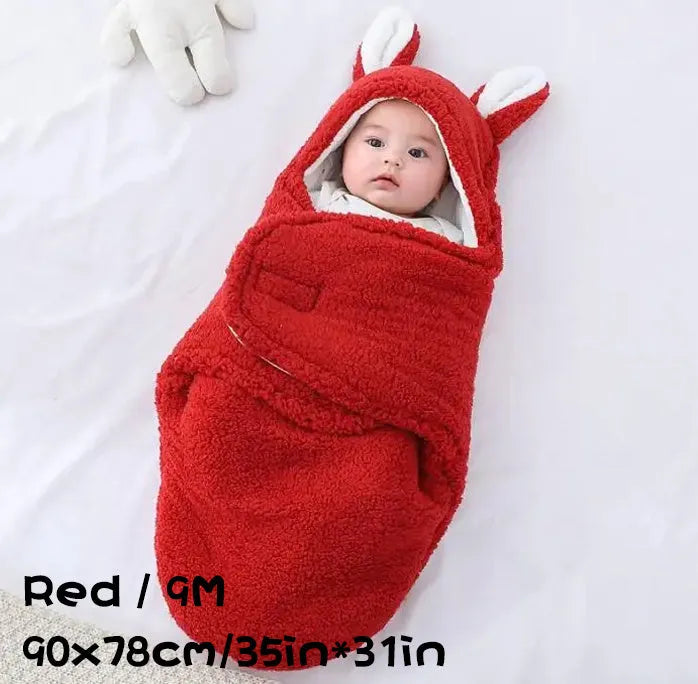 Adjustable baby sleeping bag swaddle blanket showing velcro wings and leg positioner in blue colour
