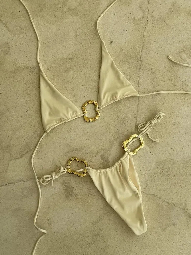 Women's solid colour halter bikini set with lace-up front detail and low-waist briefs.