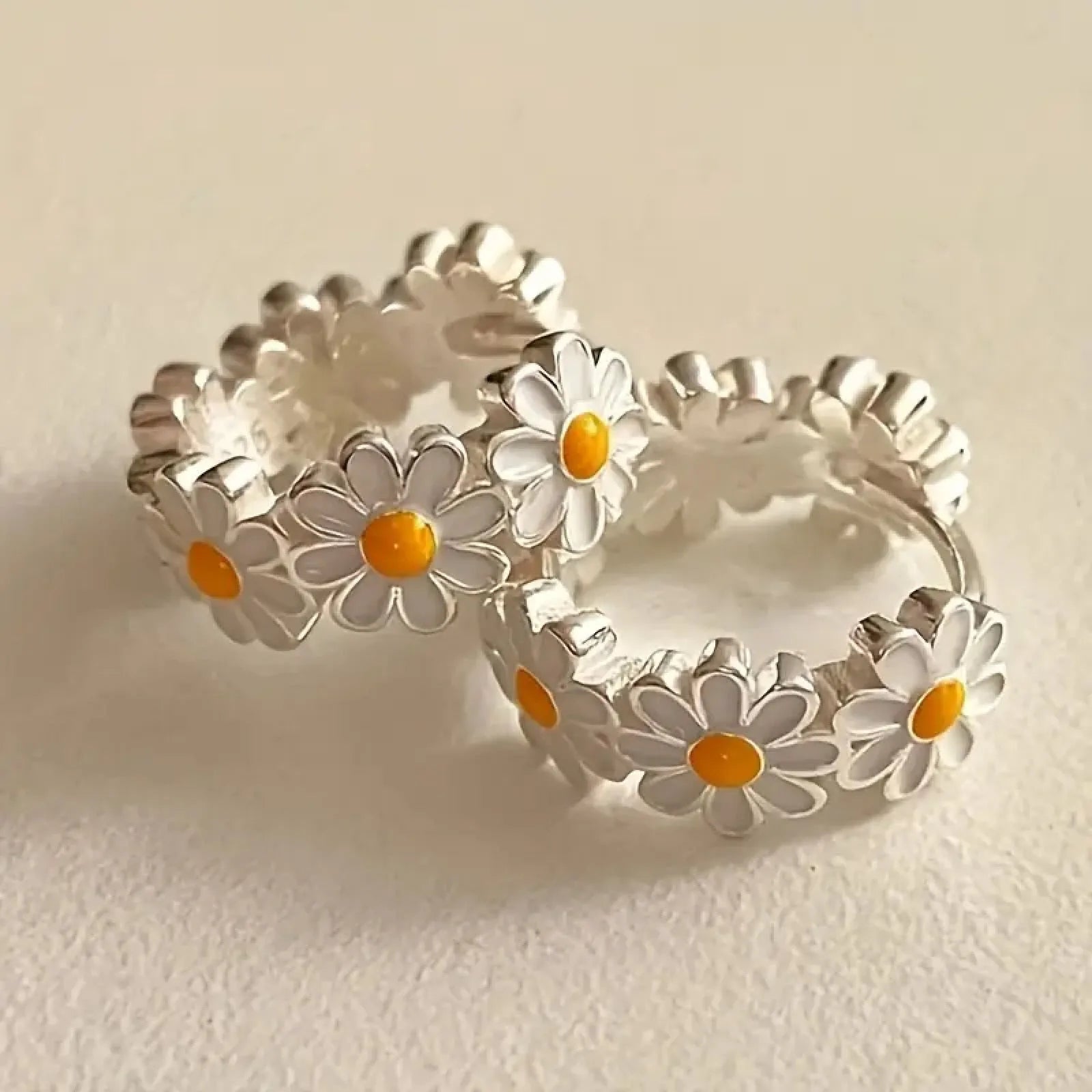 White daisy flower fashion earrings with platinum gem setting on copper construction
