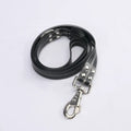 LED light-emitting pet collar and hand holding rope in orange for dog or cat visibility