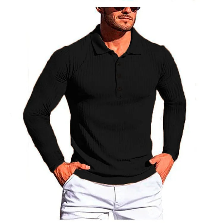 A loose-fitting short sleeve knit shirt in a striped pattern, shown on a hanger.