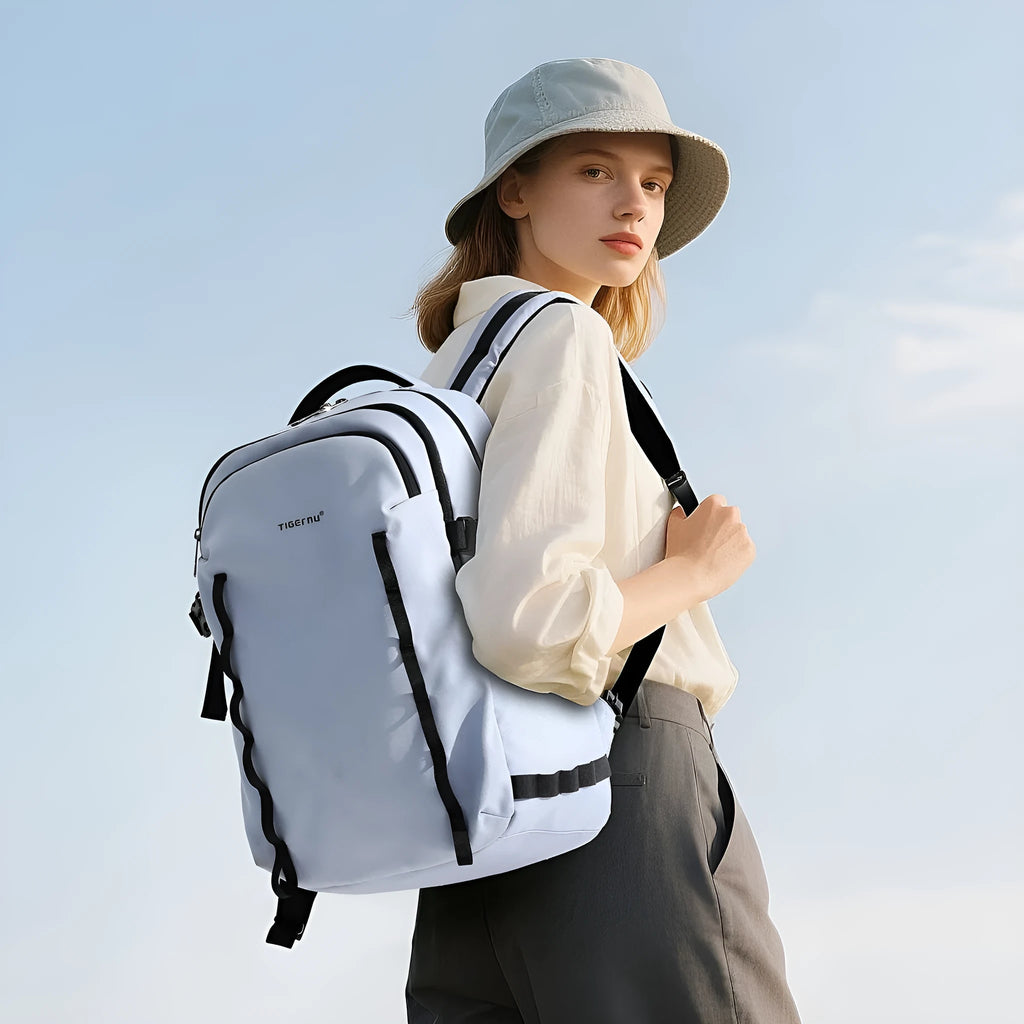 Black or light blue 20-35L waterproof Oxford cloth travel backpack with 15.6 inch size and curved shoulder straps
