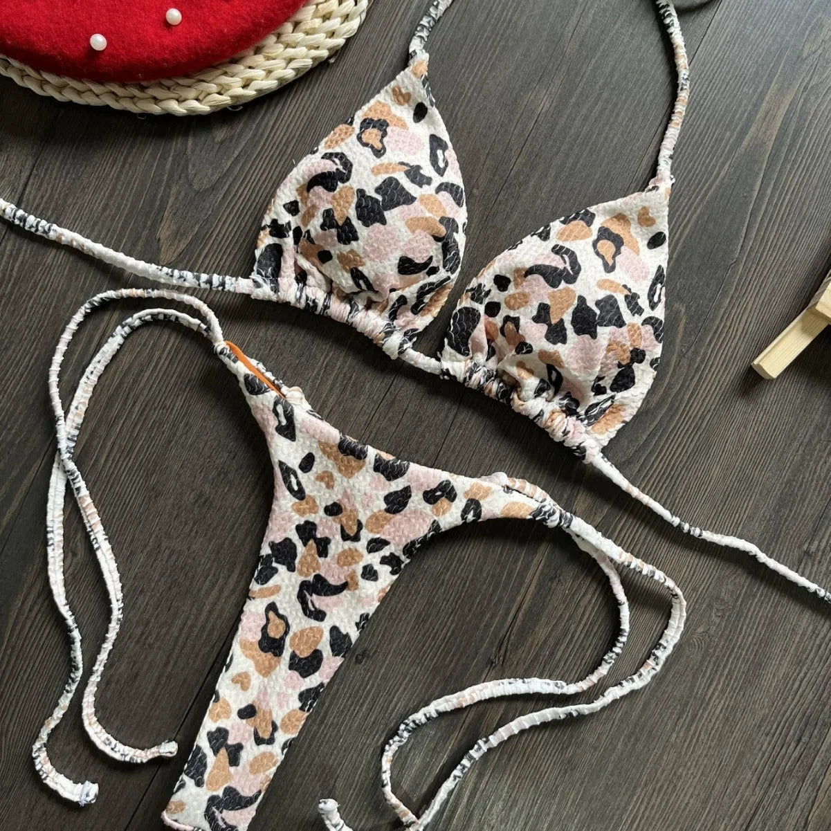 Women's blue printed bikini set with briefs, designed for swimming sports.