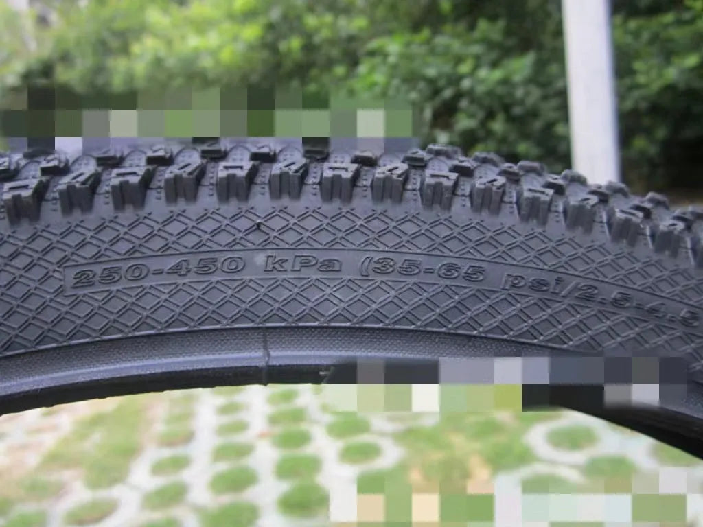 Mountain bike ultralight puncture-proof tyre showing tread pattern and white-label sidewall variant.