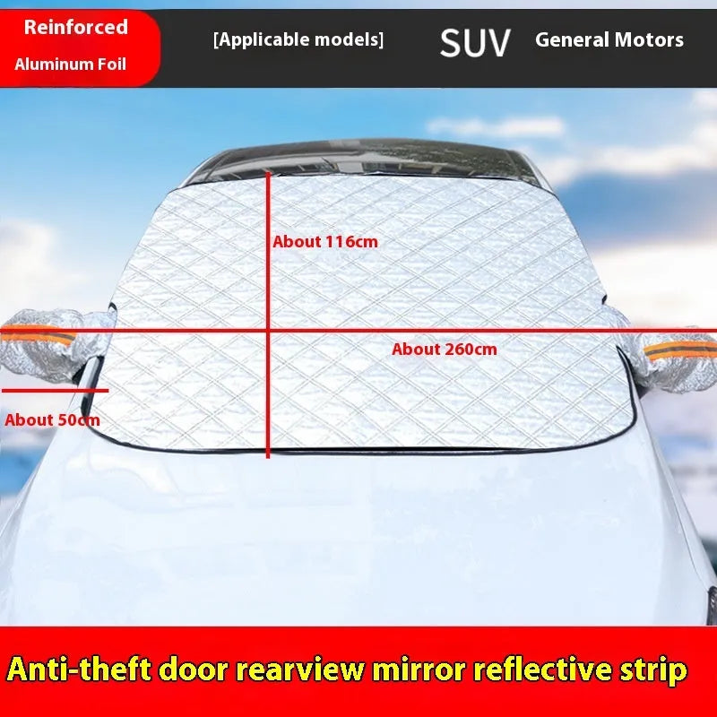 Large aluminium foil winter car cover for SUVs with reflective stripes and magnets on a vehicle windshield.