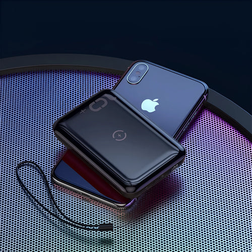 Square black wireless fast charge power bank with LED display showing battery percentage