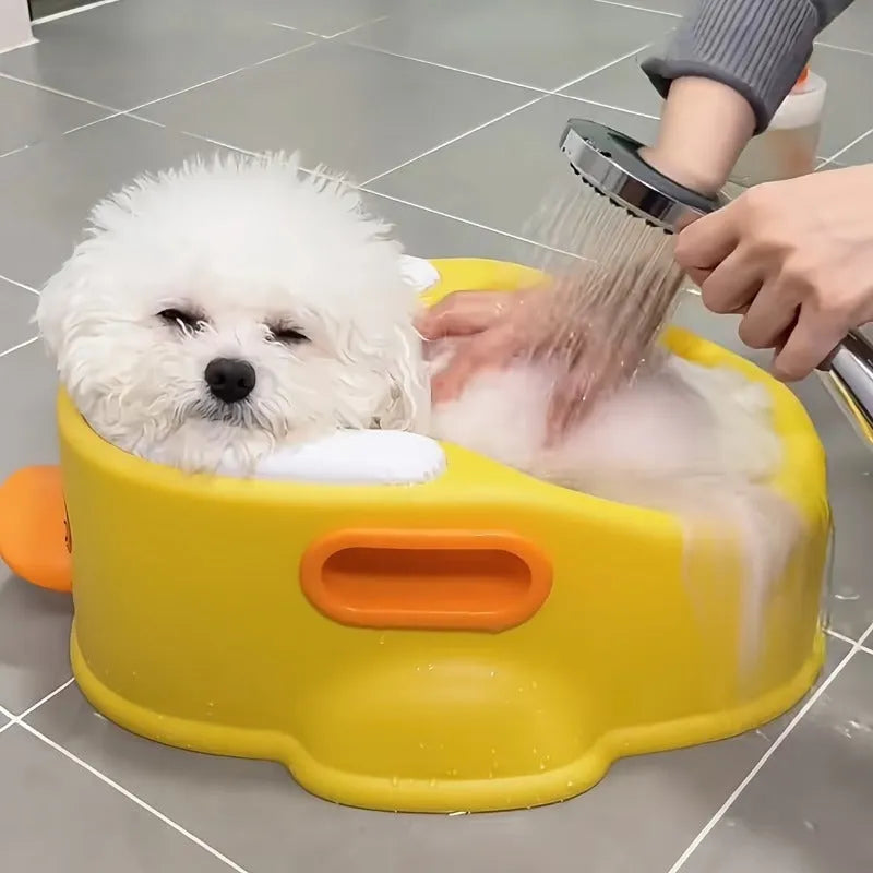 Blue PVC duck-shaped pet bath tub for dogs and cats on a plain background.