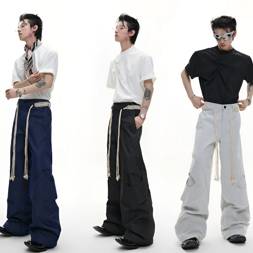 Men's heavyweight cotton straight-leg jeans with 3D cutting, decorative zipper details, and tassel accents in dark colours