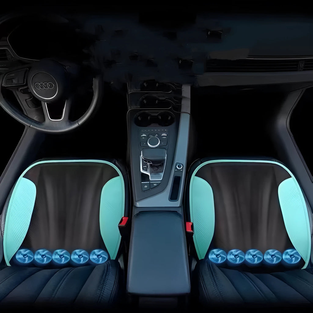 Black suede car seat cushion with USB cable and multiple cooling fans visible, placed on a car seat.