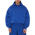 Man wearing a solid colour fleece-lined cotton pullover sweater with a wool lining.