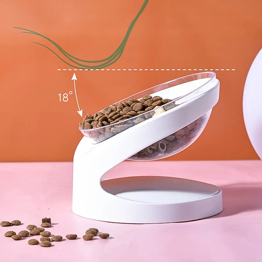 Clear plastic elevated cat food bowl with a tilted feeding platform.