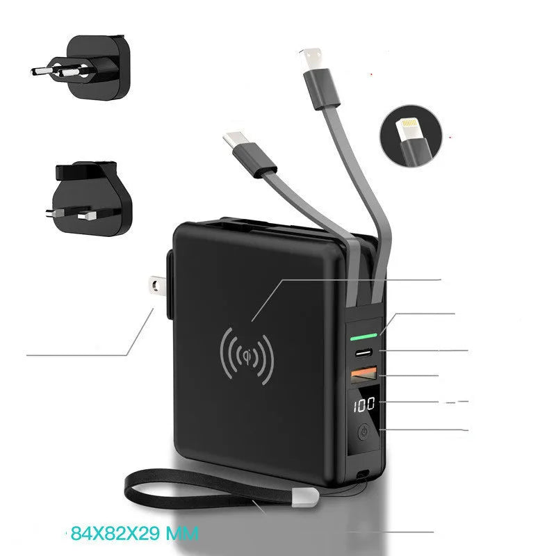 Black and white wireless charging power bank with folding UK plug and international travel adapters