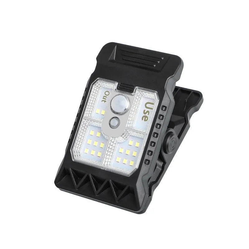 Clip lamp with motion sensor and adjustable brightness settings showing compact 11.2 x 7.6 cm design