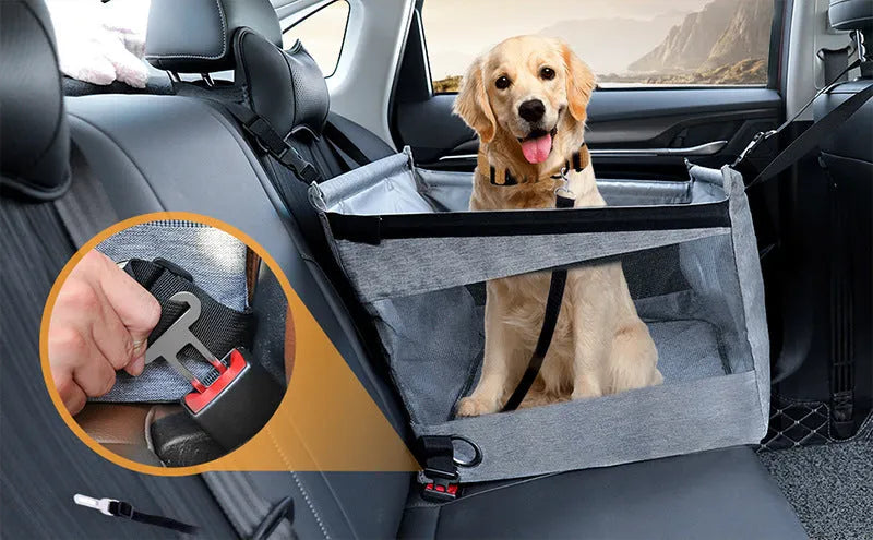 Small black Oxford cloth dog crate with mesh sides, showing carry handle and 49cm dimensions.
