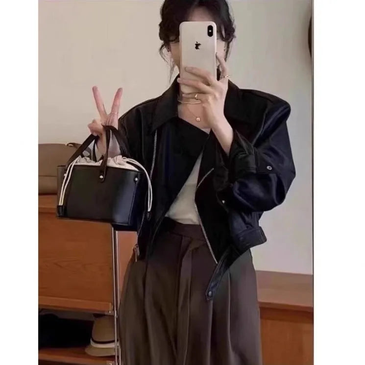 Women's brown retro imitation leather jacket with 40cm length, slim fit, regular sleeves and pocket detailing