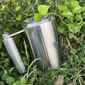 Silver stainless steel dumbbell cup weighing 8kg for strength training.