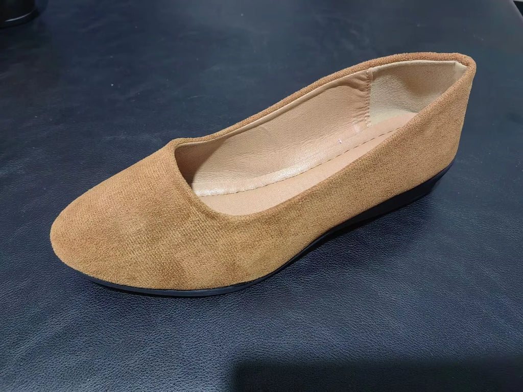 Women's pointed toe suede wedge pumps in light brown with a shallow mouth and low rubber sole.